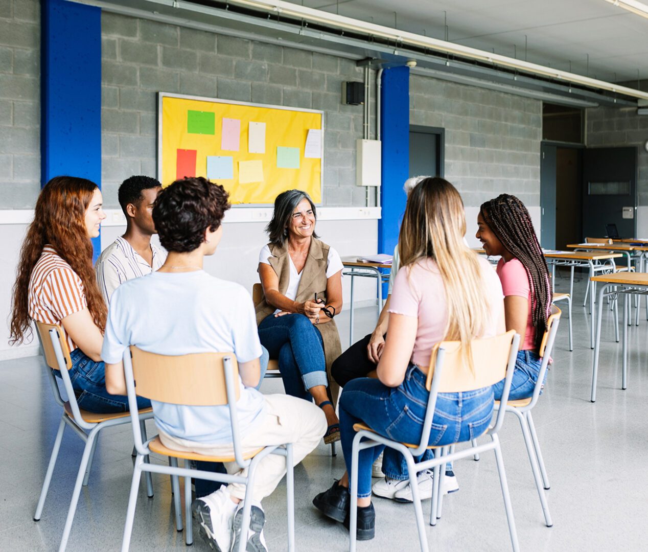 Students and teacher in a circle